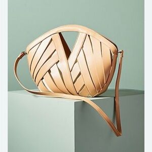 NWT Anthropologie Petite Woven Basket Bag in a light tan color.